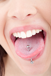 Woman with Pierced Tongue